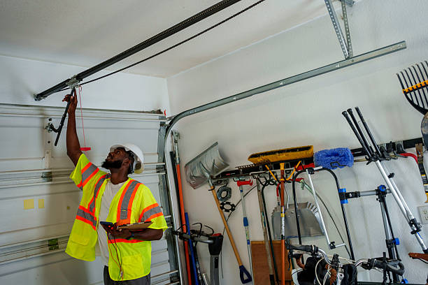 Professional Garage Door Installation technician working in Adamsville, AL